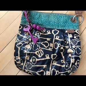 Fossil Key Per crossbody